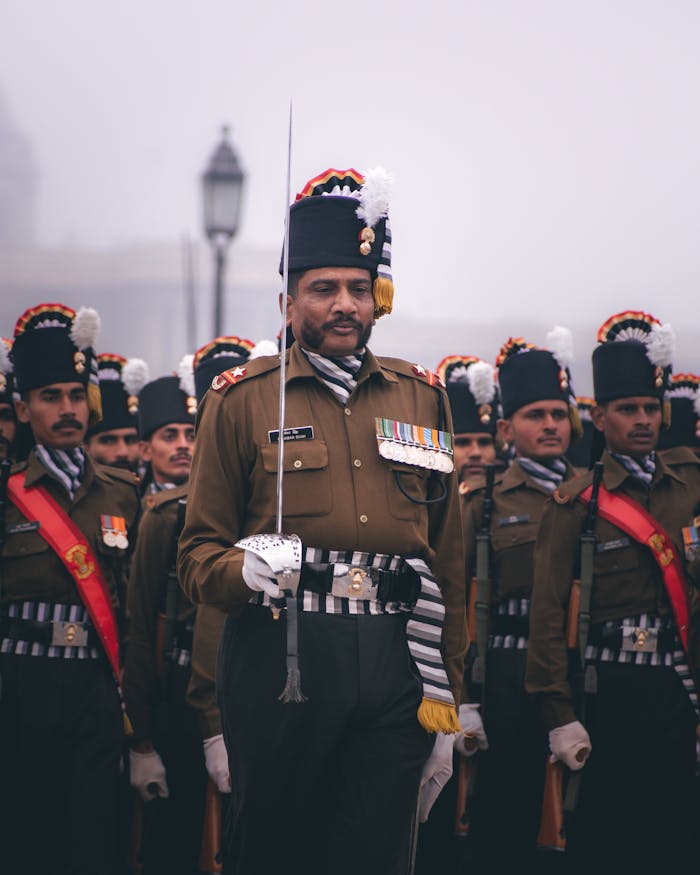 Indian soldiers in traditional uniforms during a ceremonial parade, showcasing military discipline and patriotism.